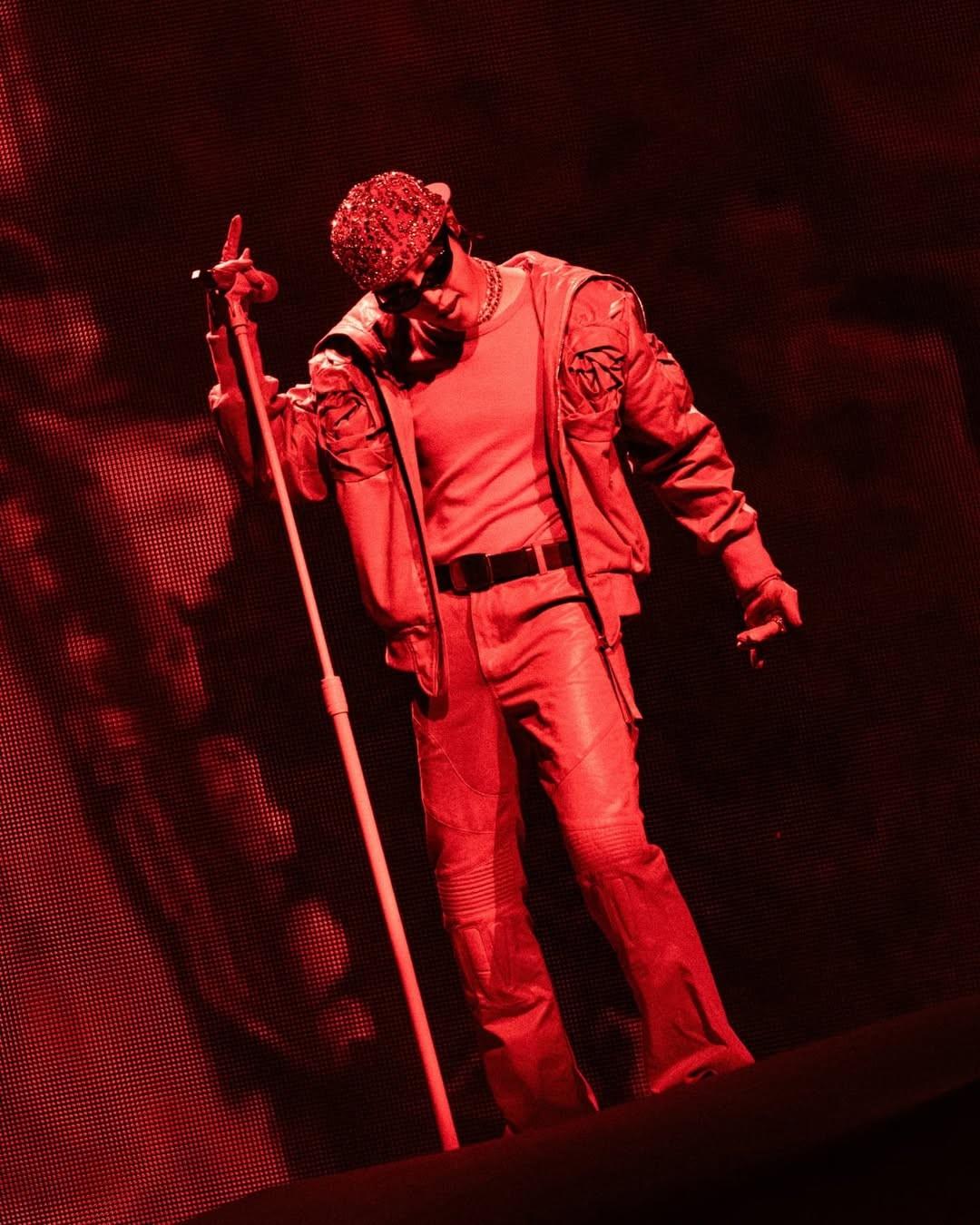 Bathed in intense red light, J-Hope stunned in a coordinated red leather look complete with a sparkly cap and statement sunglasses. His stage presence was fiery, matching the energy of tracks like 'Arson' and 'Stop.' The look screamed confidence and charisma, perfectly syncing with the set’s bold vibe